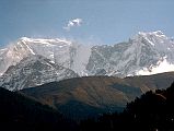 307 Nilgiri Central and Nilgiri South Close Up From Larjung Across the valley from Larjung I had a bright sun-in-your-face view of the west face of the Nilgiri peaks, with Nilgiri Central (6940m) and Nilgiri South (6839m) visible. 